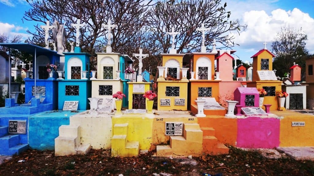 row of brightly coloured graves