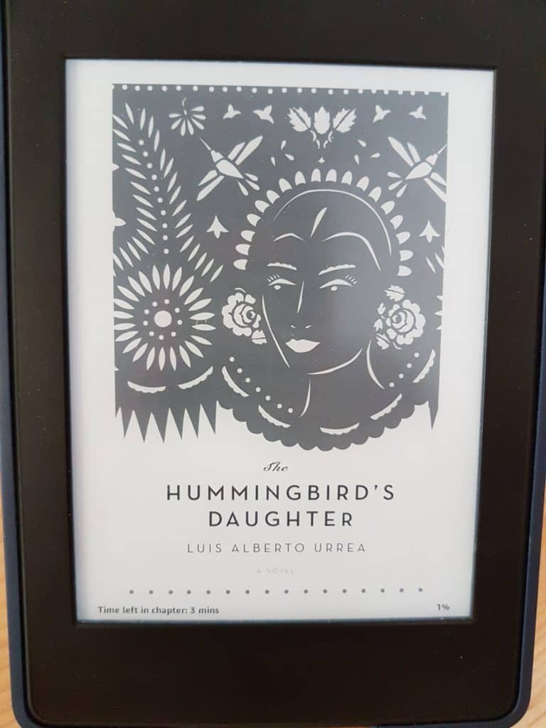 paper cut front cover of book on a kindle