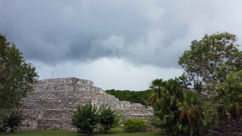 Maya pyramid (Xcambo) and grey clouds