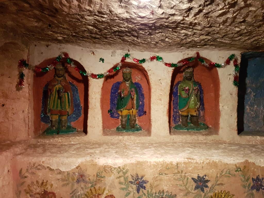 three kings painted on wall in little altars.