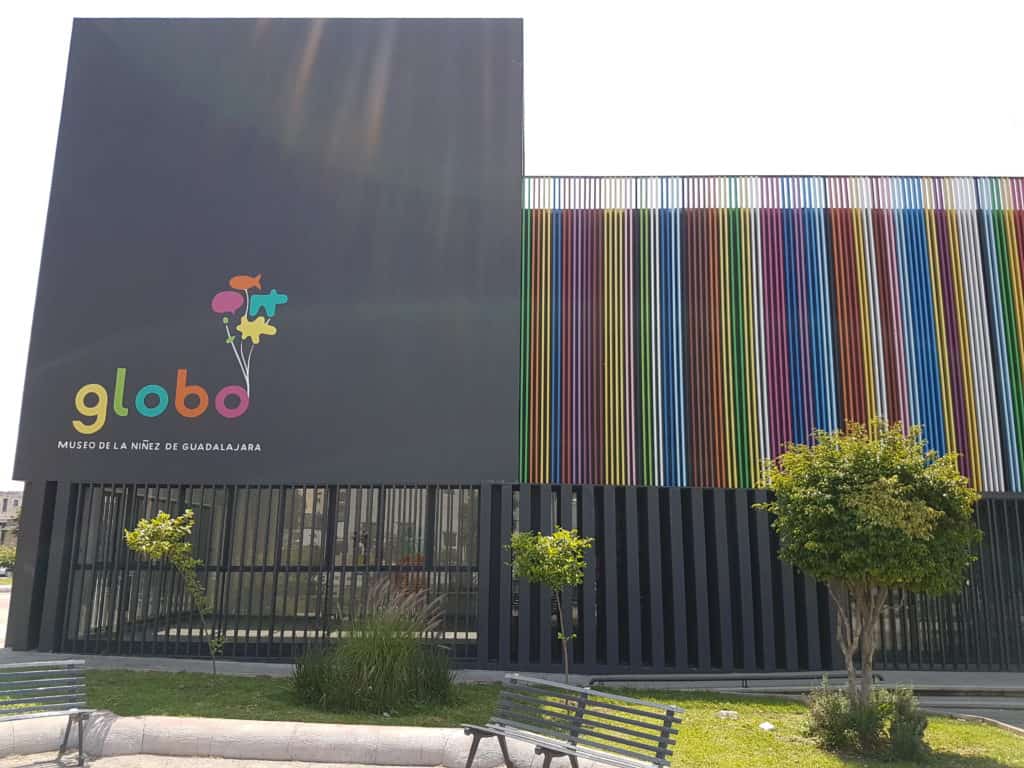 Globo musuem, Guadalajara (black building, balloons on it, stripy building next door)