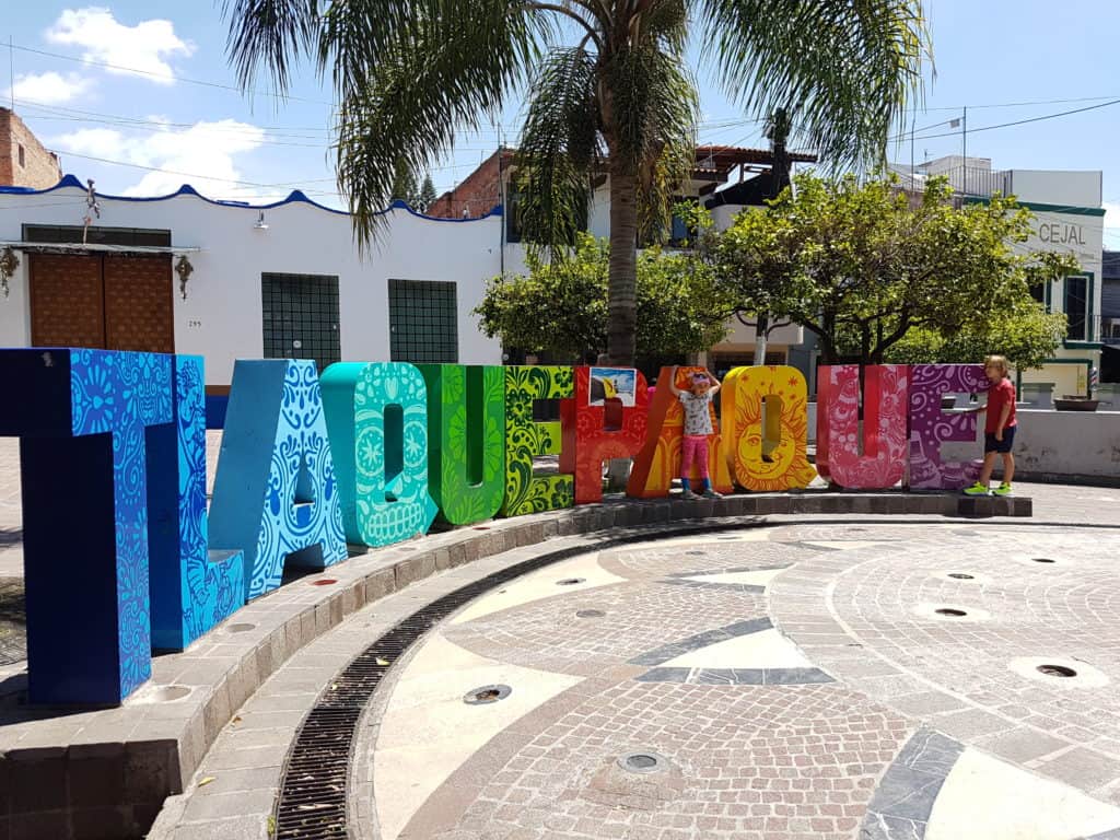 Tlaquepaque sign, colourful, at an angle
