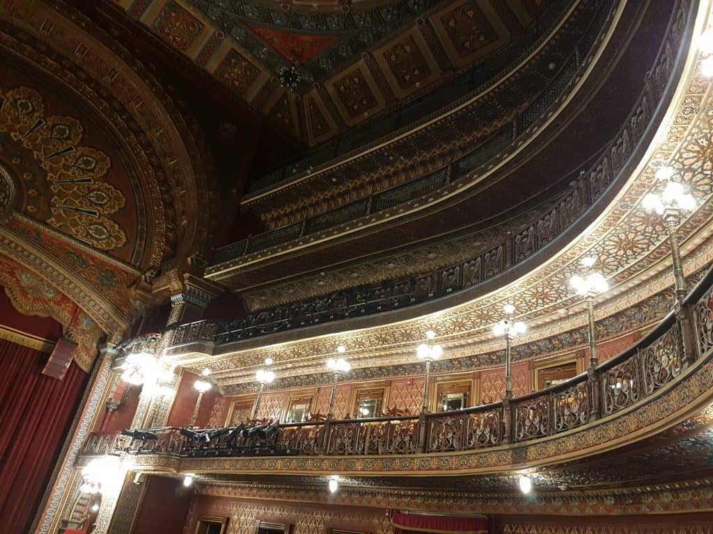 Inside Teatro Jaurez in Guanajuato looking at balconies and ceiling detail