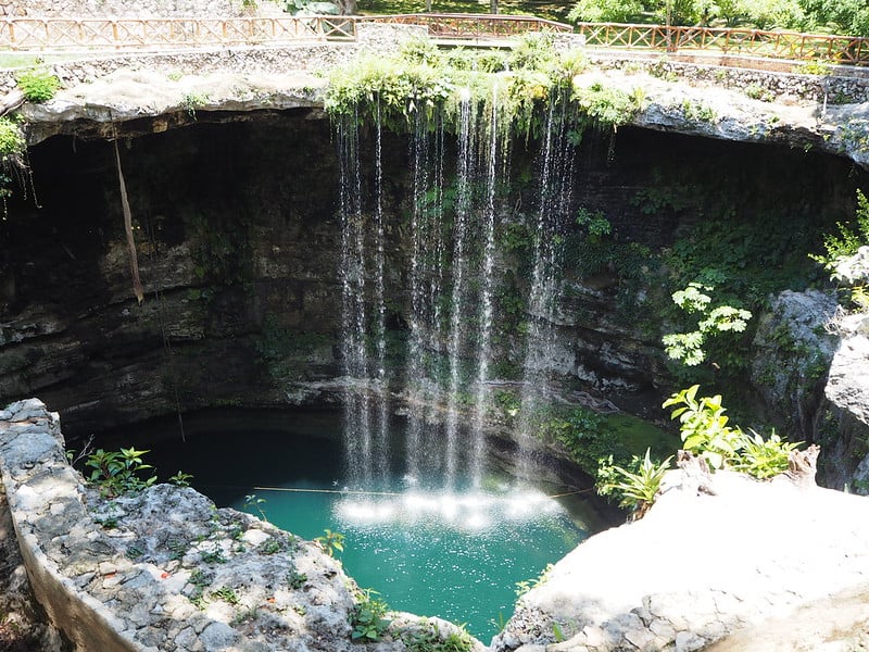 cenote with waterfall