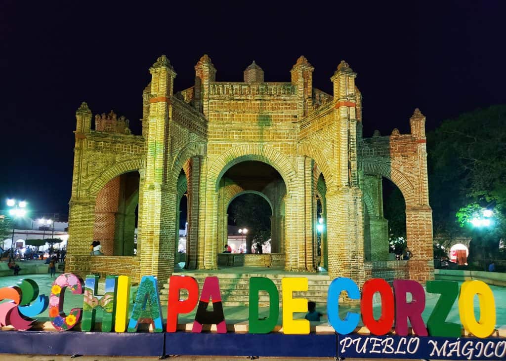 Chiapa de Corzo letters, elaborate fountain in a building behind (night time)