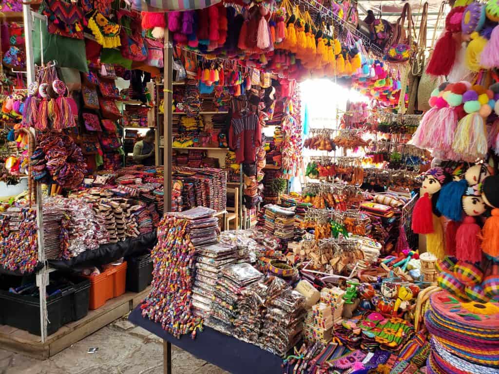market stall full of brightly coloured souvenirs