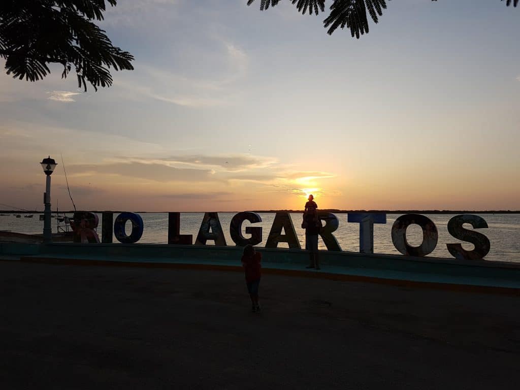 rio lagartos letters with gentle sunset behind