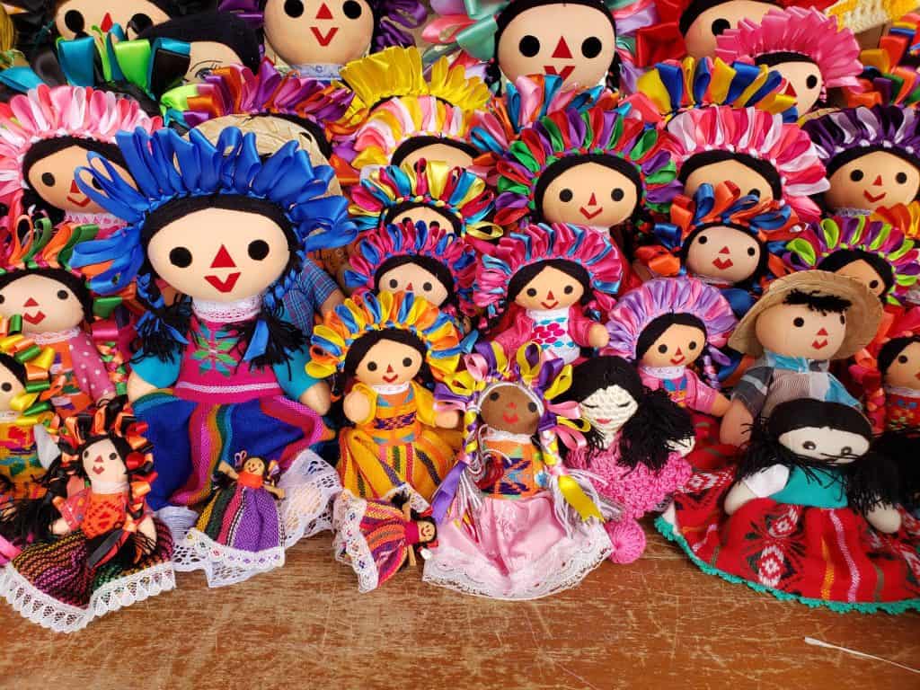 screen full of traditional mexican dolls