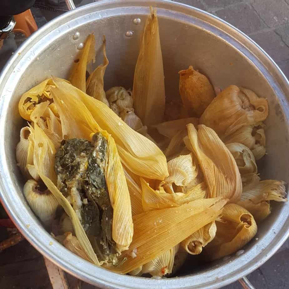 pot of corn wrapped tamales