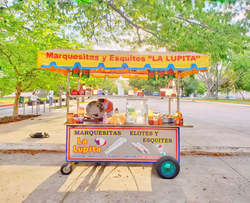 street food stand under trees