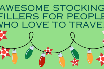green background. writing says "awesome stocking fillers for people who love to travel", christmas lights, stars and a stocking hanging off the final L