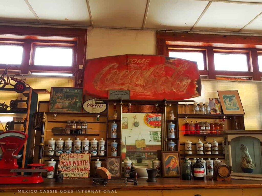 old fashioned drink store. big coca cola sign