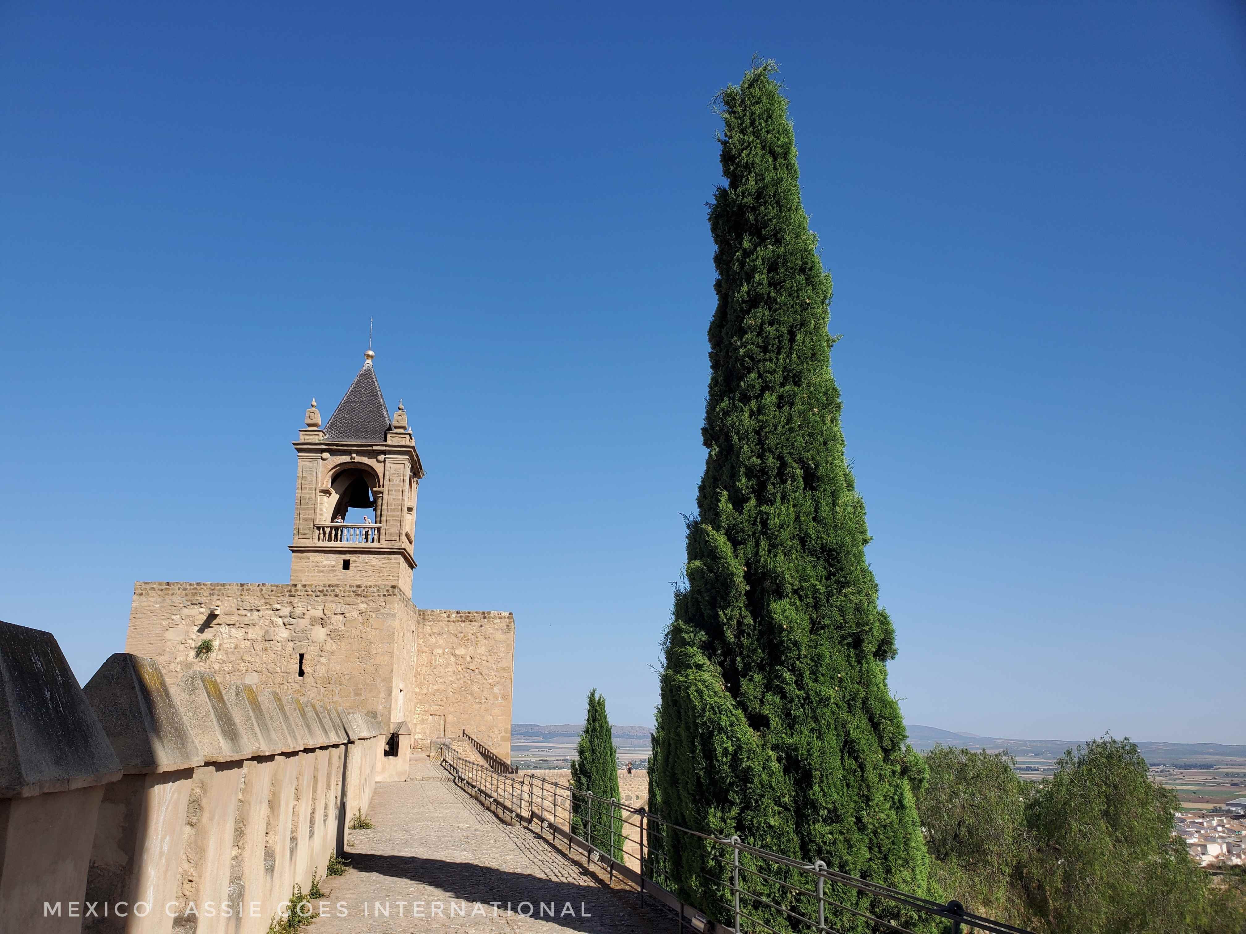 view of alcazaba bell tower from along the ramparts