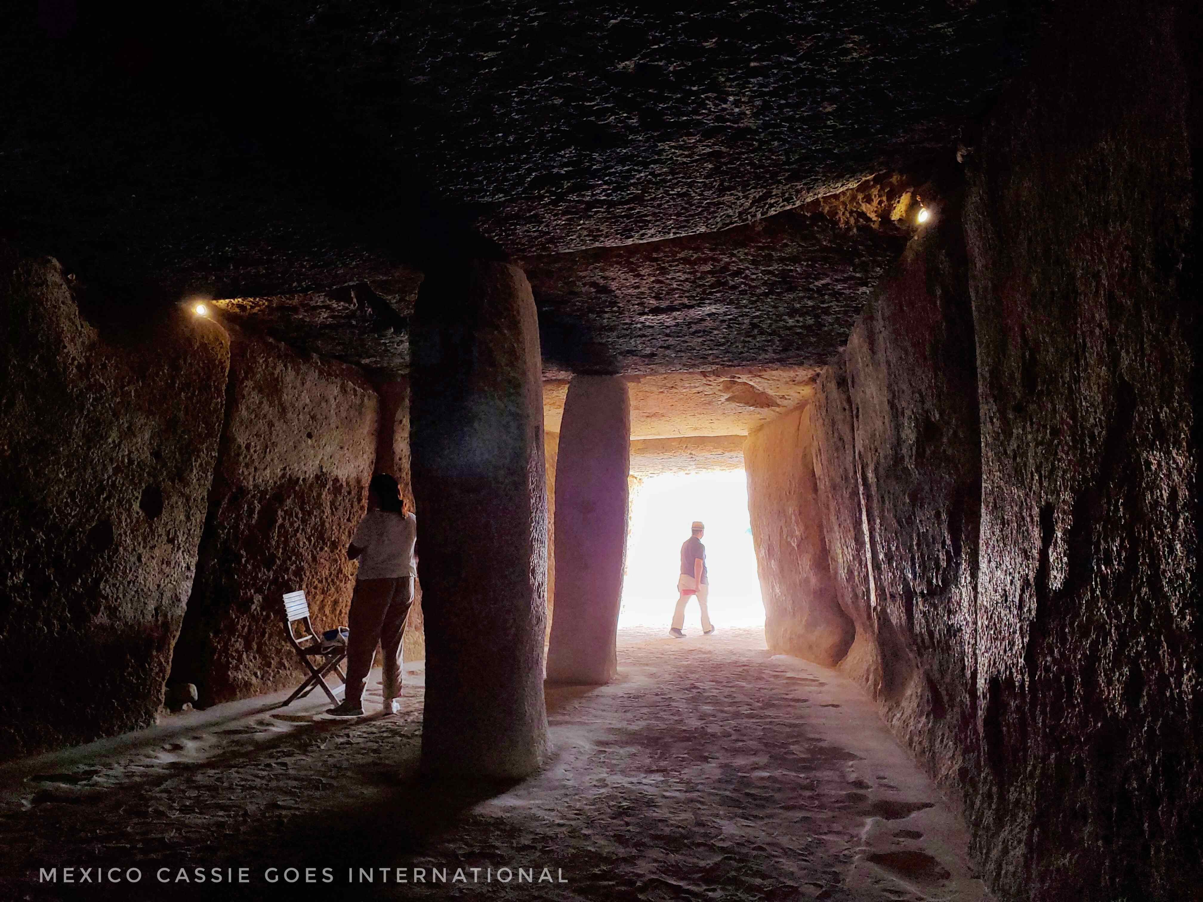 view from inside of a dolmen. two standing rocks supporting giant slabs of roof