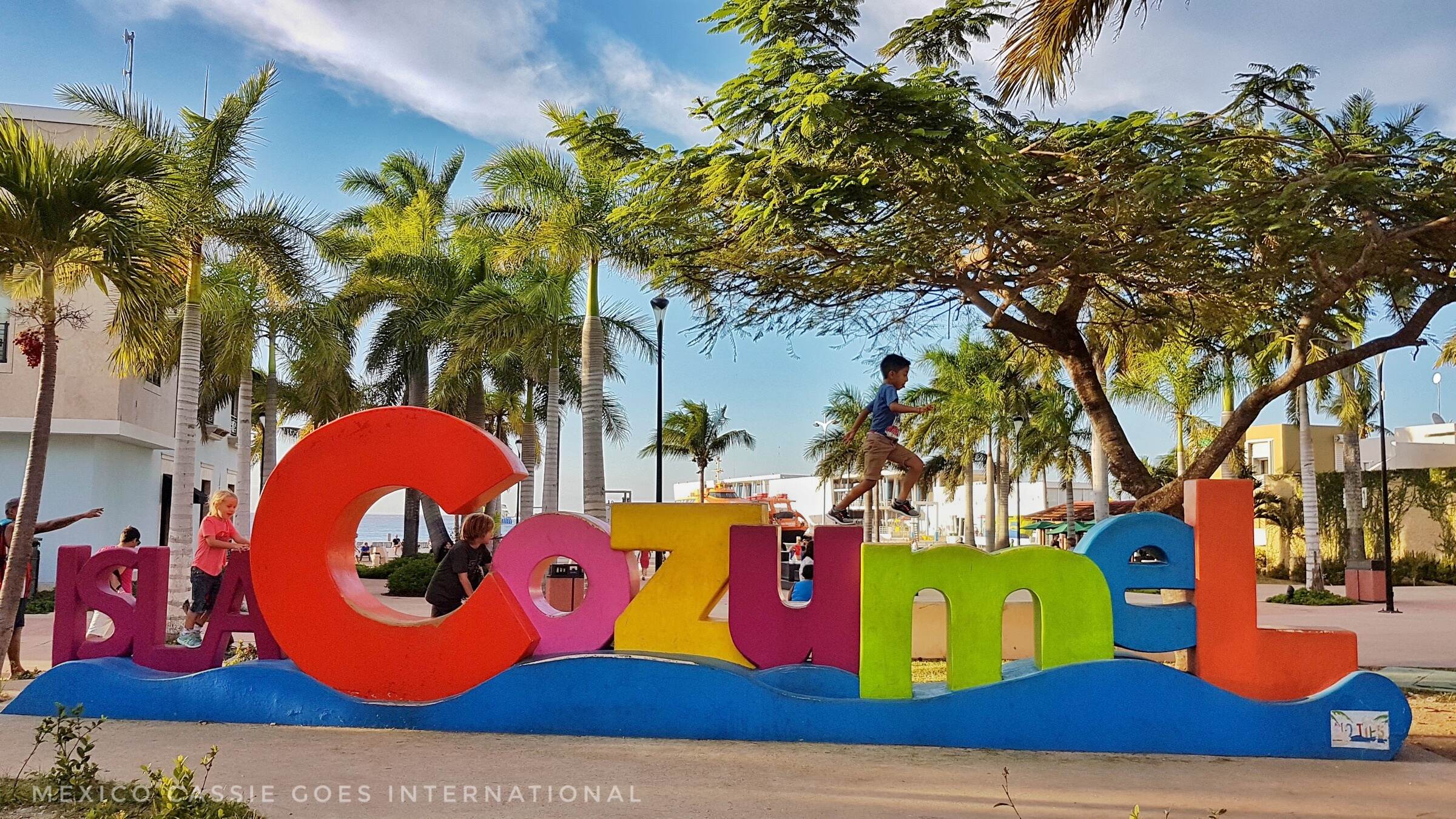 COZUMUEL letters- Kid running over the top of them