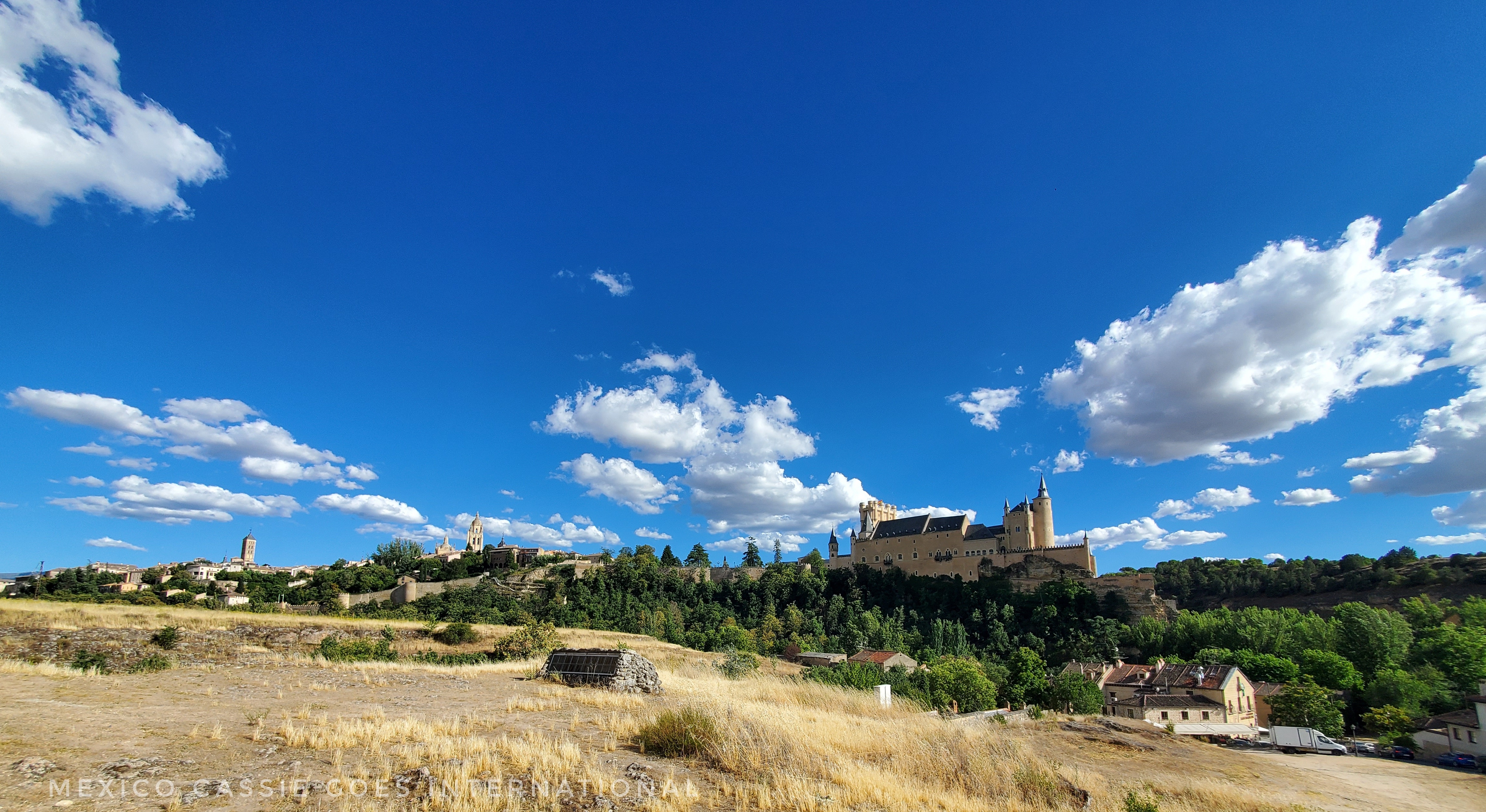 view of fields and blue skies Segovia on skyline