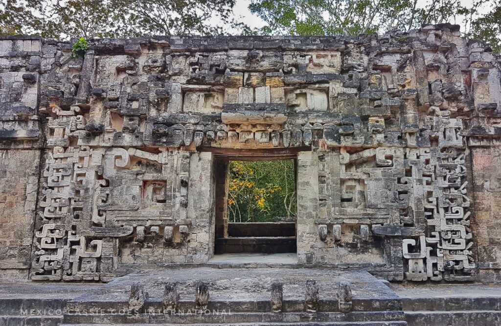 section of maya ruin - doorway with carved blocks to make it look like a mouth