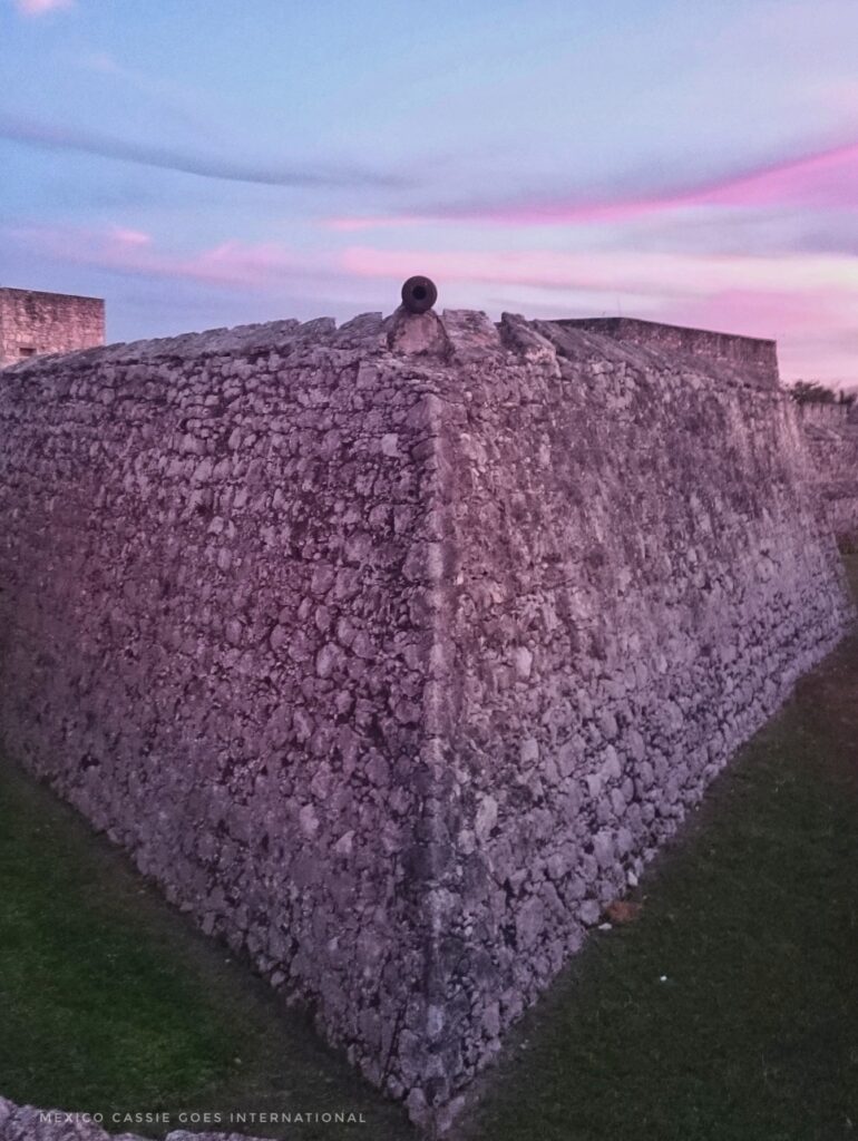 fort walls at dusk, pink sky