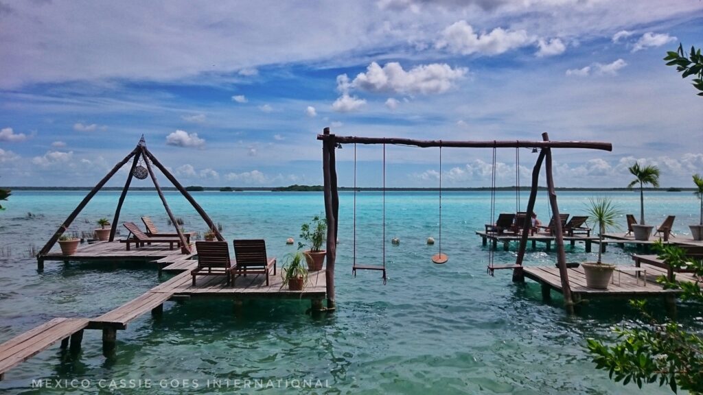view of swings over water in Bacalar