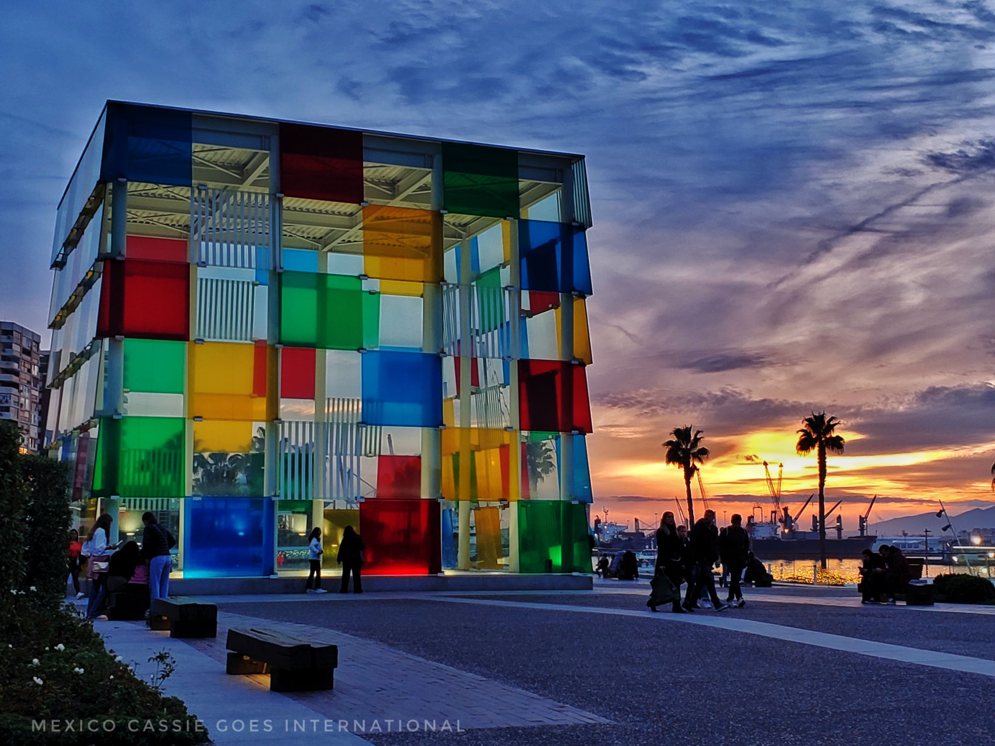 Pompidou box in Malaga - cleear, red, yellow, green and blue squares of glass making a large box. Dusk