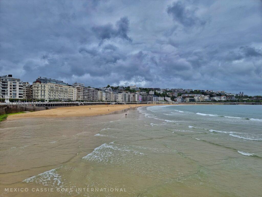 long urban beach, cloudy day