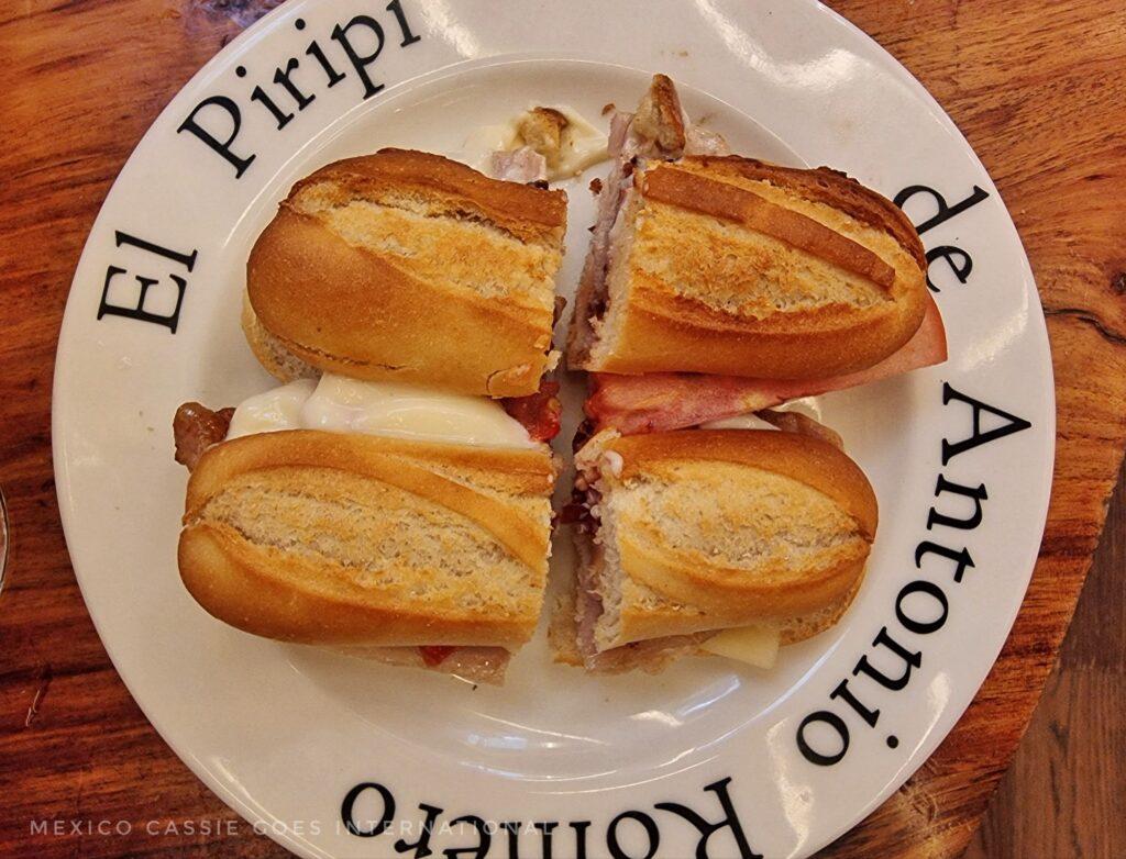 2 Spanish crusty bread sandwiches cut in half