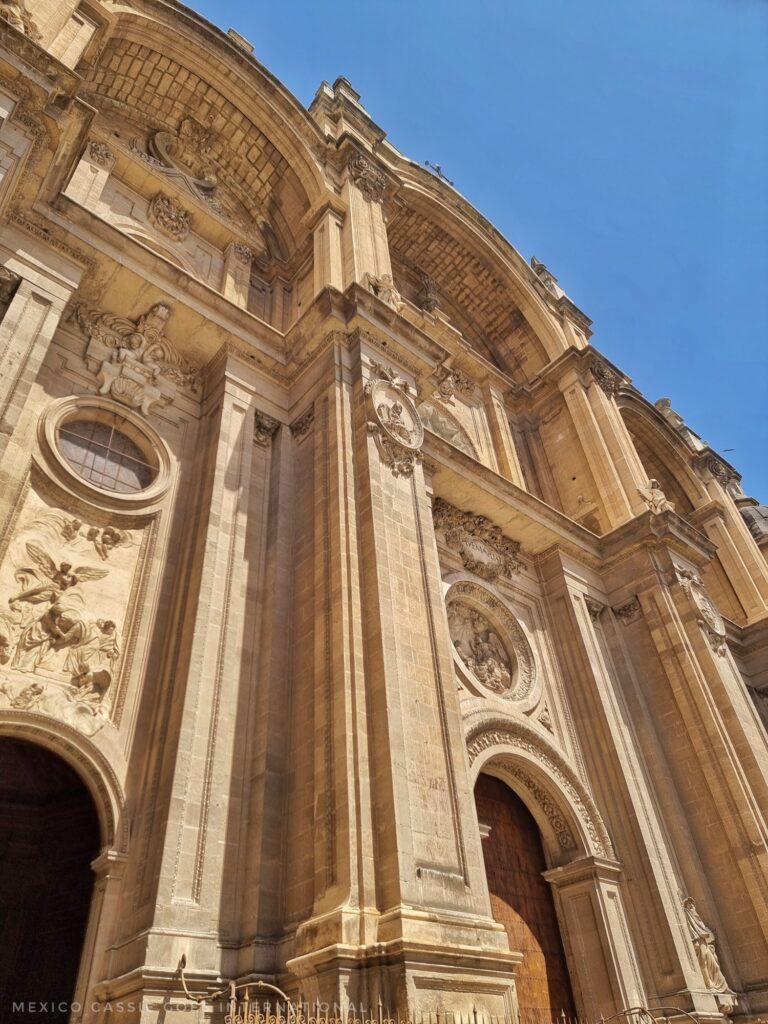 photo taken outside the entrance to the granada cathedral looking up