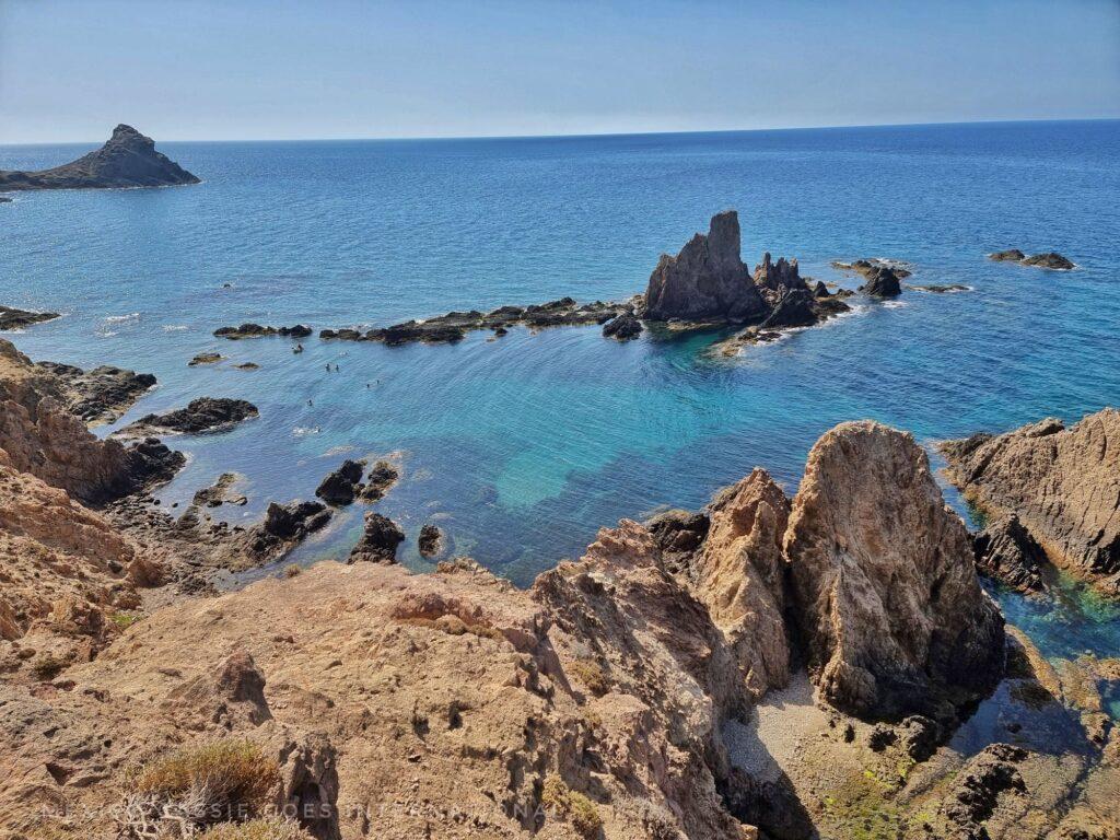 rocky outcrops in blue water