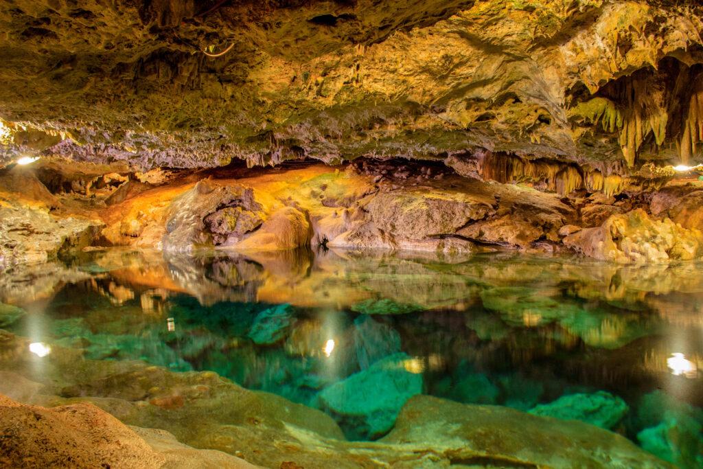 gorgeous clear green water in a cave (lit)