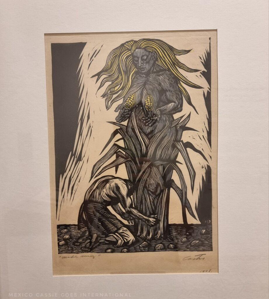 detailed wood cut of a woman emerging from a corn - Indigenous man at her feet, on his knees. Only colour is her breasts (which are corn) and her hair
