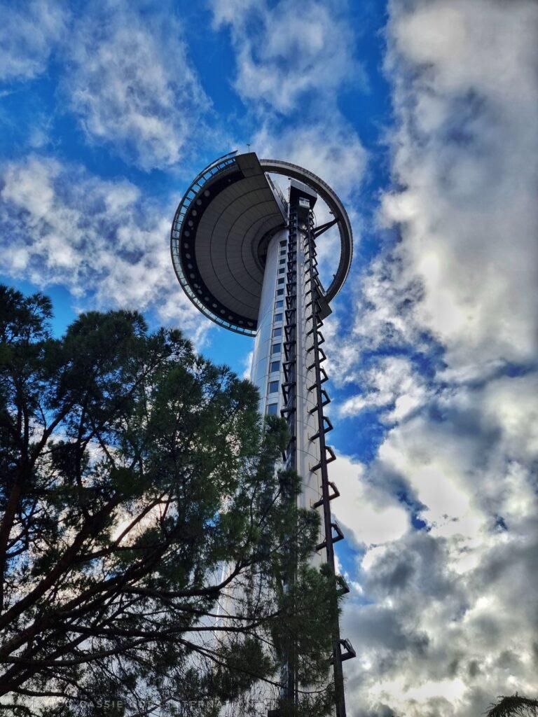 tall tower with circular area at top