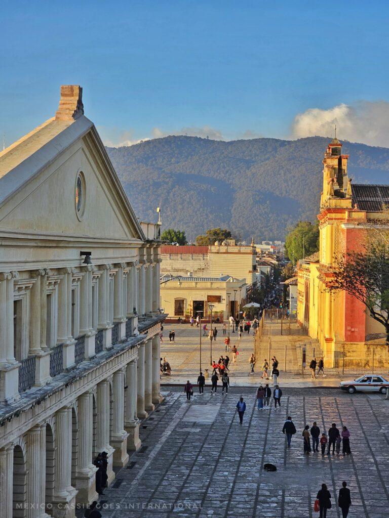 view of san cristobal plazas at 5pm - light shining on cathedral