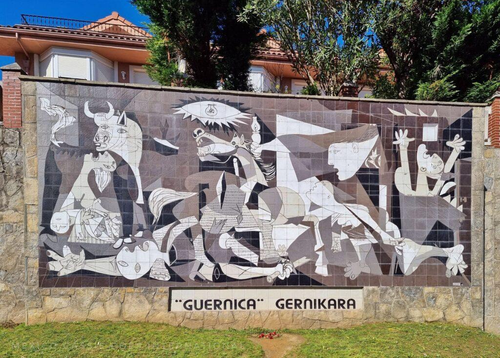 photo of the tile replica of Picasso's Guernica painting
