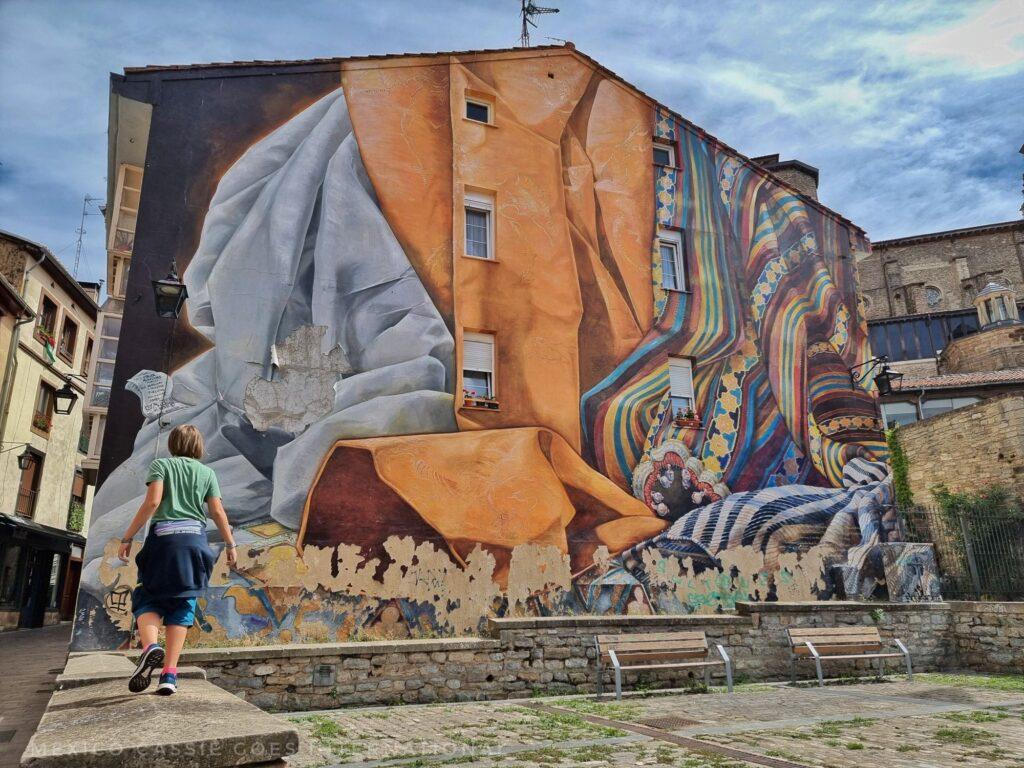 large mural on a plaza in Vitoria - different materials represented