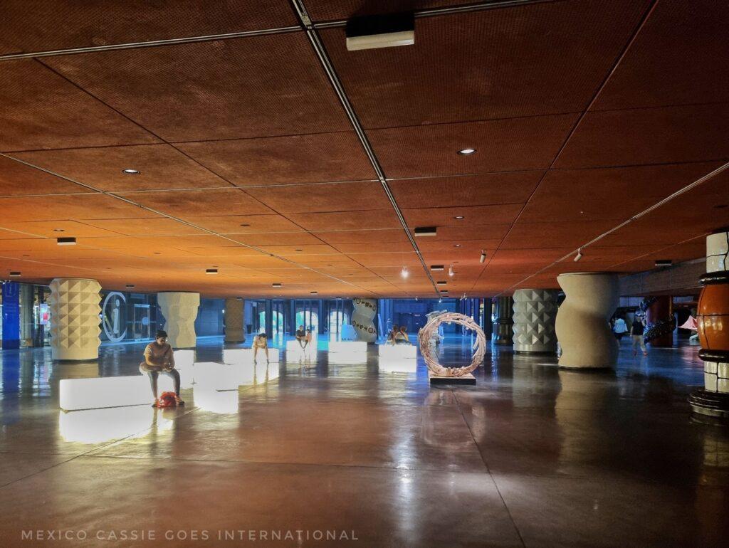 large atrium with fun pillars and dark ceiling