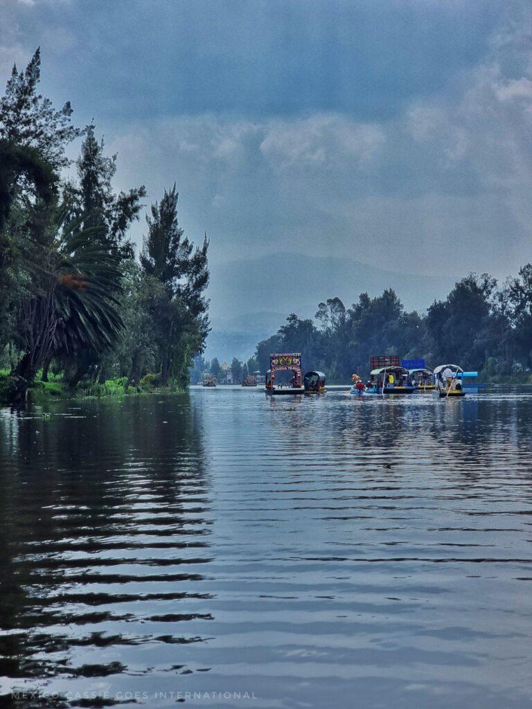 calm water, boats in distance
