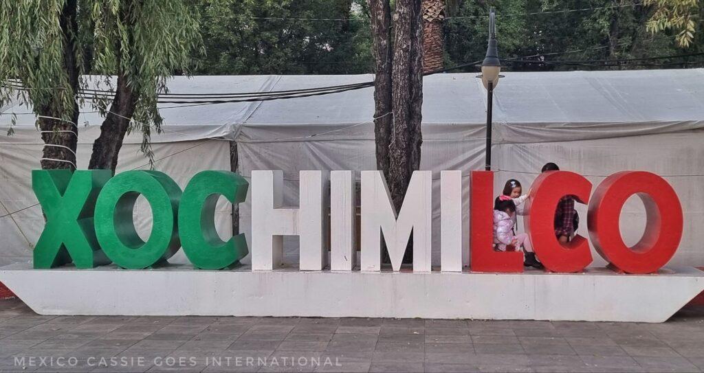 Xochimilco letters, XOC in green, HIMI, in white and LCO in red