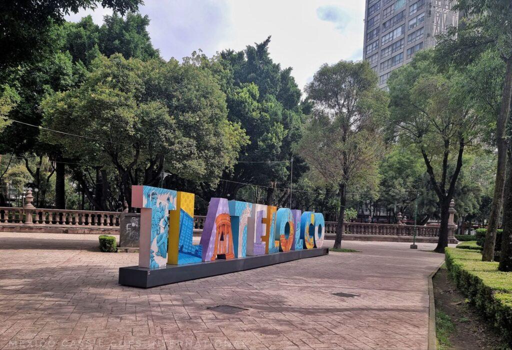 giant Tlatelolco letters in a park
