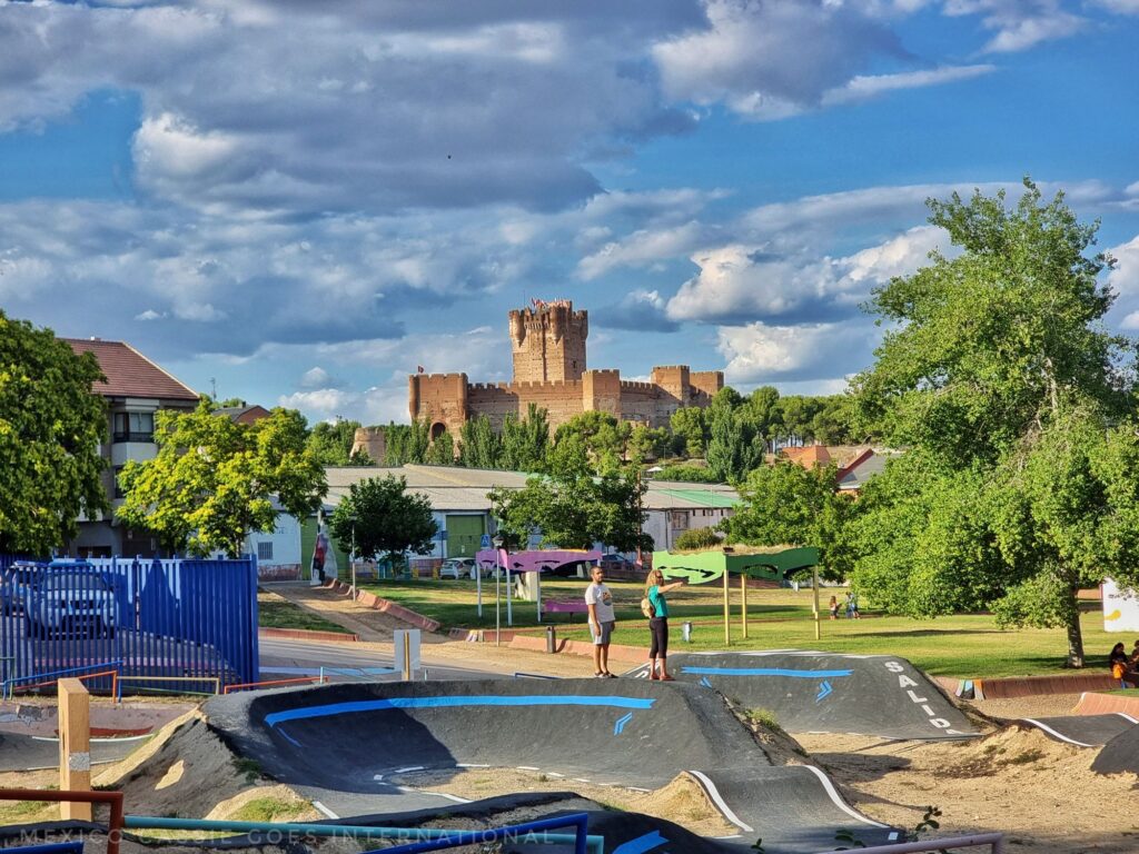 view of castle with kids' pump track in foreground