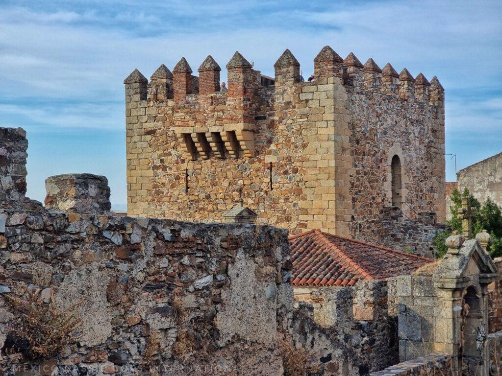 view of a medieval tower with crenelations