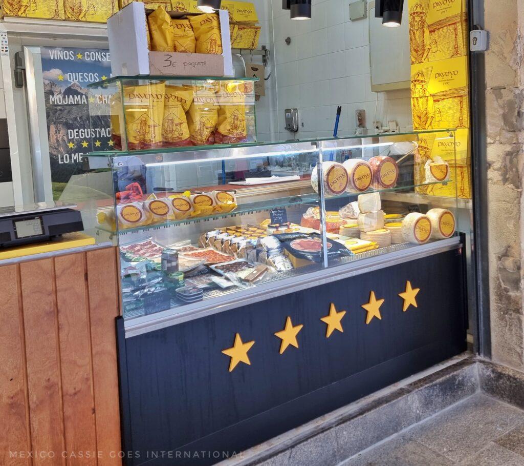 cheese stand in a market. 5 stars on blue background