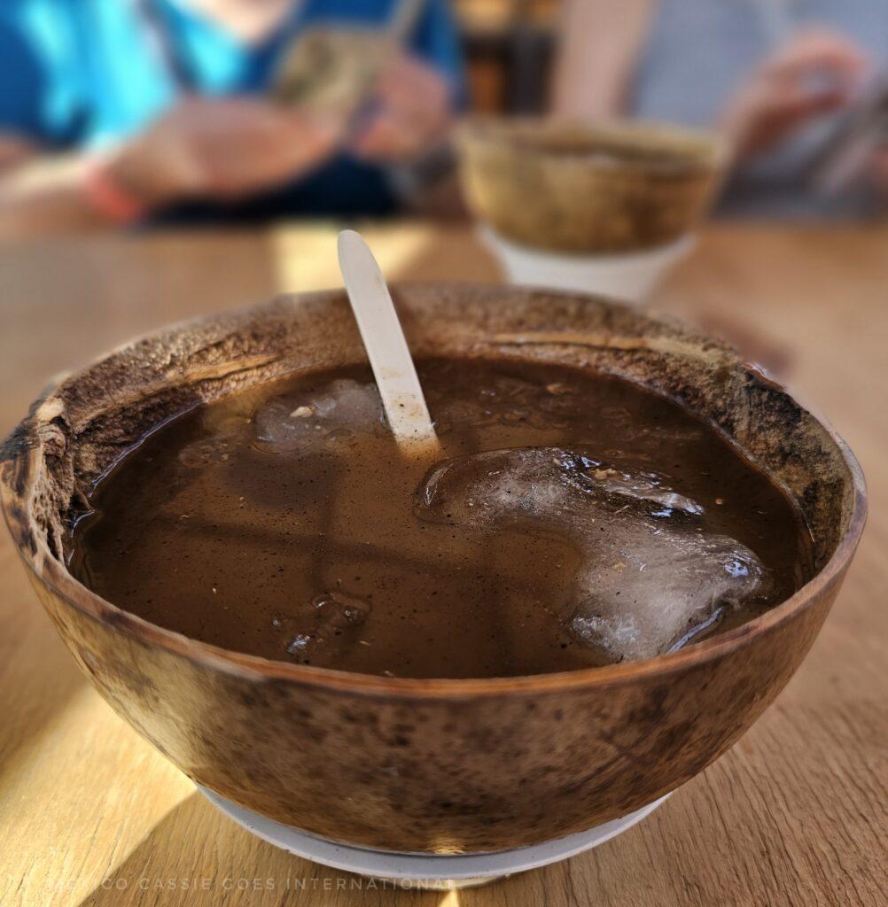 pozol served in a half gourd vessel