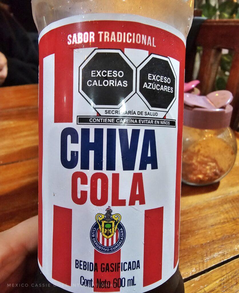 Chiva Cola bottle close up (red and white striped lablel)