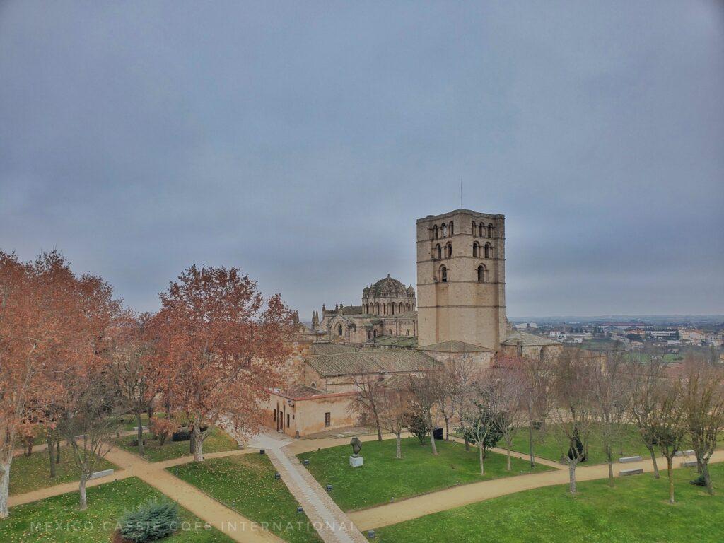 zamora cathedral from a distance, park with intersecting paths