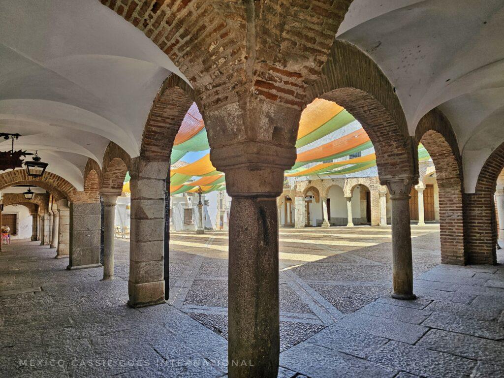 columns and arches around a plaza