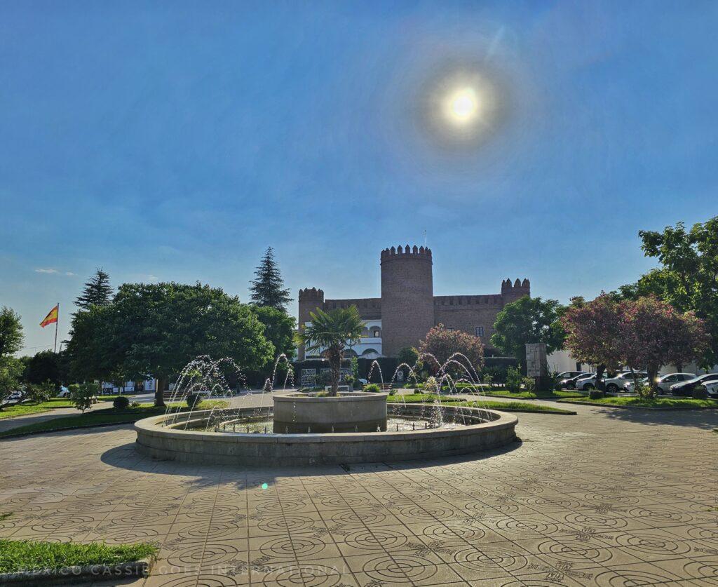 parador from the plaza, sun in sky