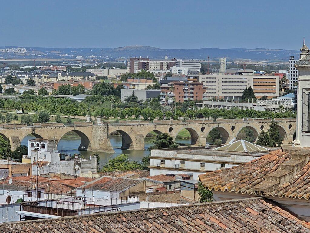 view of old arched bridge over river