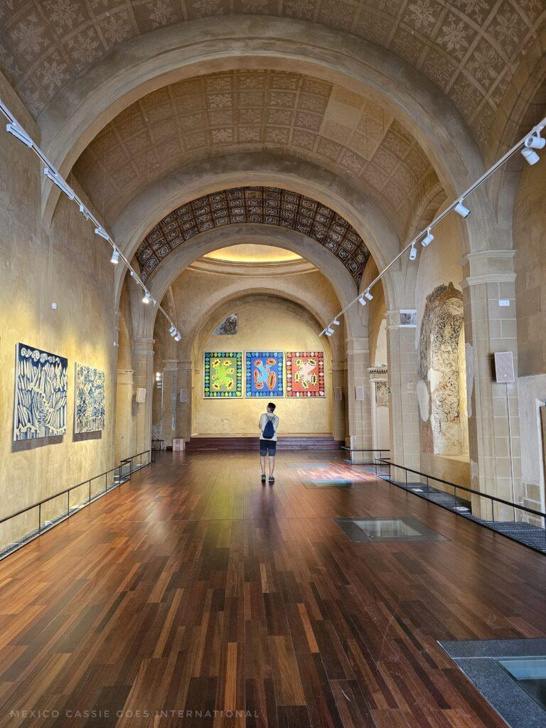 interior of an old church that's now an art gallery