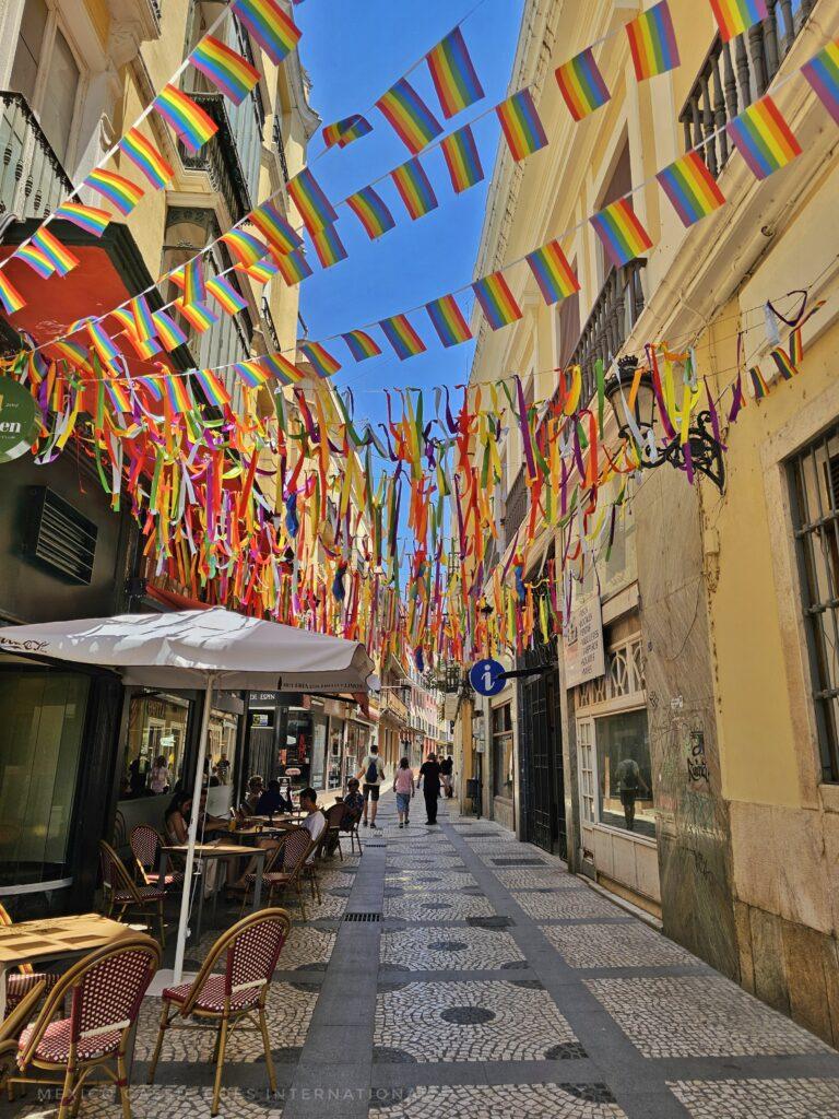 old pedestrian street covered in bunting