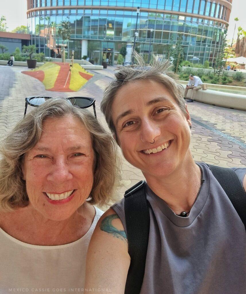 Cass and happy client smiling at the camera